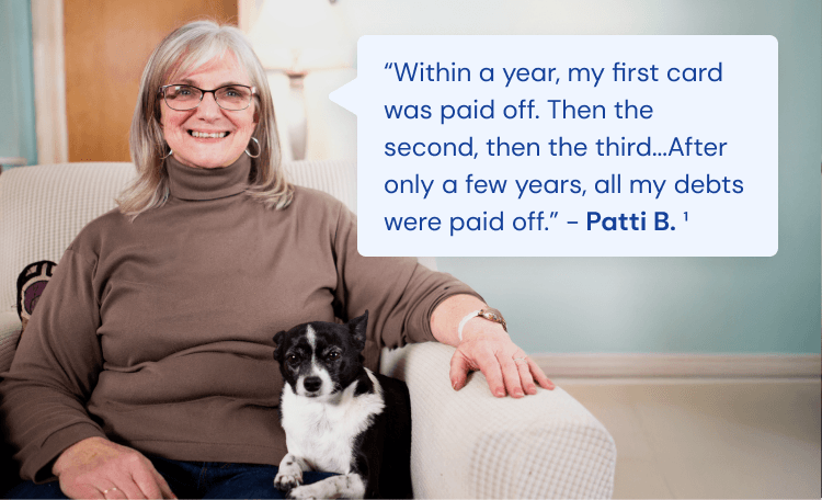 woman with long brown hair smiling because she has found debt relief